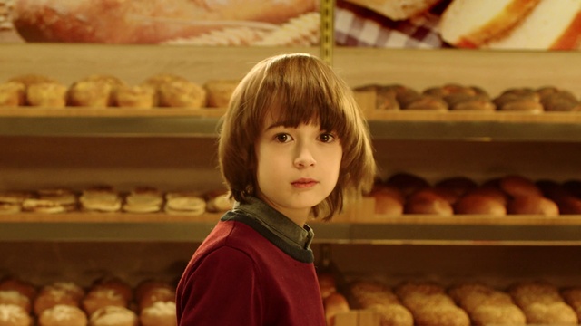 Video Reference: Yellow, Food, Blond, Bakery, Cuisine, Smile, Baking, Child, Sweetness, Baked goods