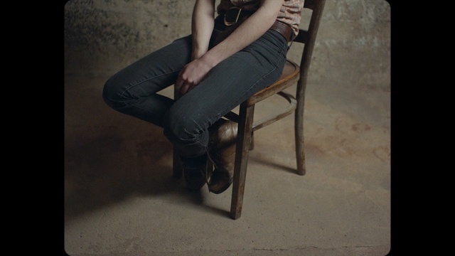 Video Reference: sitting, leg, human leg, chair, tights, furniture, shoe, girl, thigh, joint, Person