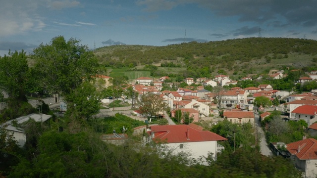 Video Reference: Residential area, Mountain village, Suburb, Village, Town, Human settlement, Neighbourhood, Hill station, Rural area, Sky