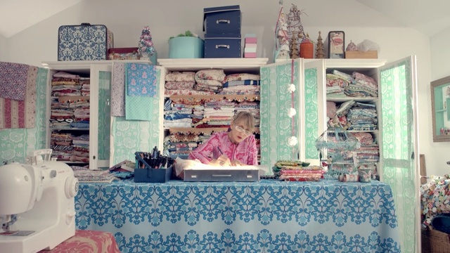 Video Reference: room, textile, boutique, home, product, interior design, window, linens, Person