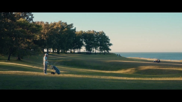 Video Reference: Sport venue, Nature, Golf course, Golf club, Golf equipment, Morning, Tree, Sky, Horizon, Recreation