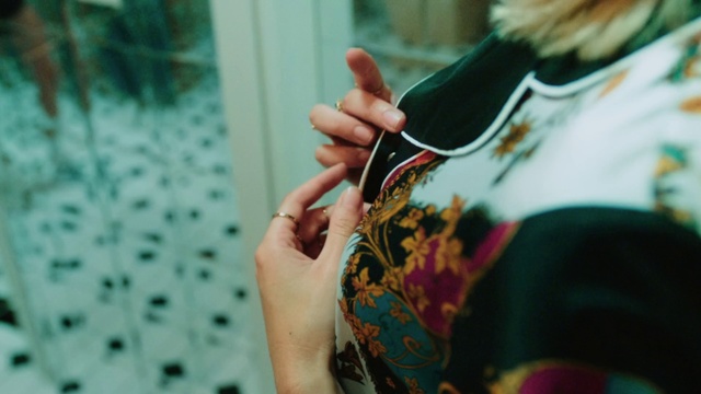 Video Reference: Hand, Finger, Arm, Ear, Black hair, Long hair, Glasses, Wrist