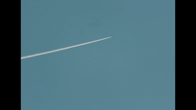 Video Reference: sky, blue, atmosphere, daytime, text, azure, line, air travel, cloud, wing