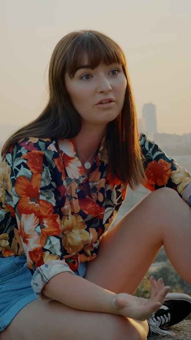 Video Reference: Leg, Thigh, Sitting, Bangs, Human leg, Long hair, Brown hair, Person