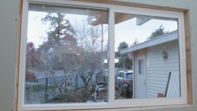 Video Reference: window, property, home, house, door, sash window, siding, real estate, facade, glass, Person