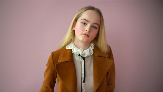 Video Reference: Hair, Blond, Yellow, Hairstyle, Outerwear, Cheek, Long hair, Portrait, Tie, Suit, Person