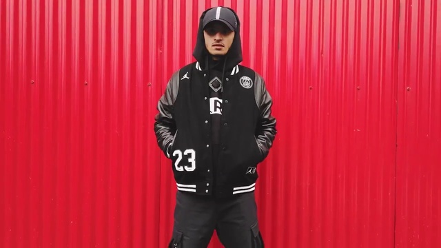 Video Reference: Clothing, Red, Outerwear, Jacket, Hoodie, Sportswear, Sleeve, Dry suit, Person
