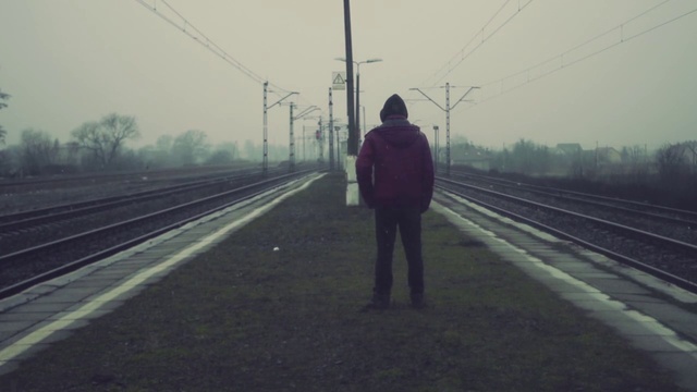 Video Reference: Transport, Track, Atmospheric phenomenon, Mode of transport, Morning, Standing, Line, Thoroughfare, Sky, Railway