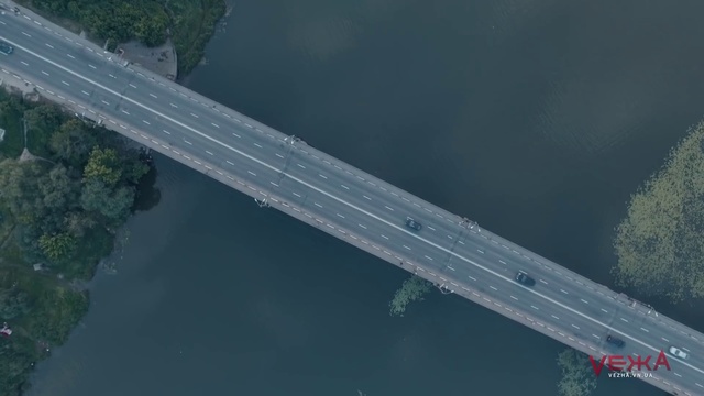 Video Reference: Aerial photography, Sky, Bridge, Road, Screenshot, Photography, Concrete bridge, Thoroughfare, Fixed link, Nonbuilding structure