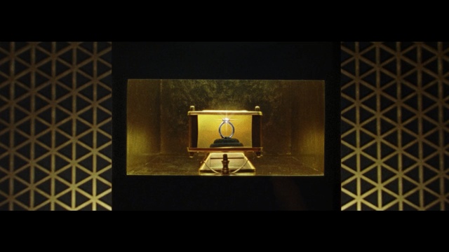 Video Reference: yellow, text, light, darkness, lighting, light fixture, computer wallpaper, design, font, symmetry