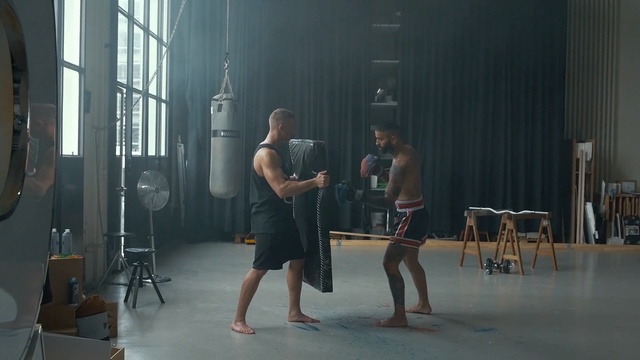 Video Reference: room, physical fitness, muscle, sport venue, performance art, joint, Person