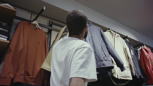 Video Reference: Clothes hanger, Room, Dry cleaning, Textile, Ceiling, Closet, T-shirt