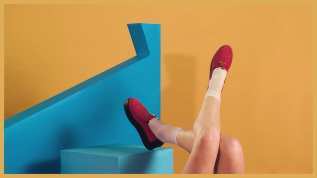 Video Reference: Finger, Hand, Plastic, Thumb, Nail, Person, Yellow, Holding, Front, Small, Screen, Monitor, Table, Orange, Woman, Young, Man, Red, Girl, Television, Playing, Remote, Player, Standing, Pink, Game, Video, Phone, Ball, White