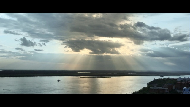 Video Reference: sky, horizon, cloud, sea, water, atmosphere, cumulus, reflection, calm, morning