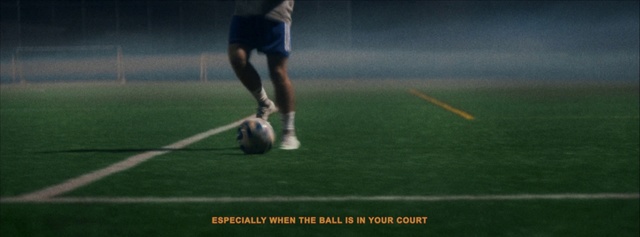 Video Reference: Sports equipment, Football, Soccer ball, Ball game, Ball, Soccer, Player, Kick, Football player, Sports, Grass, Person, Sport, Game, Man, Field, Playing, Holding, Swinging, Jumping, Air, Standing, Court, Baseball, White, Athletic game