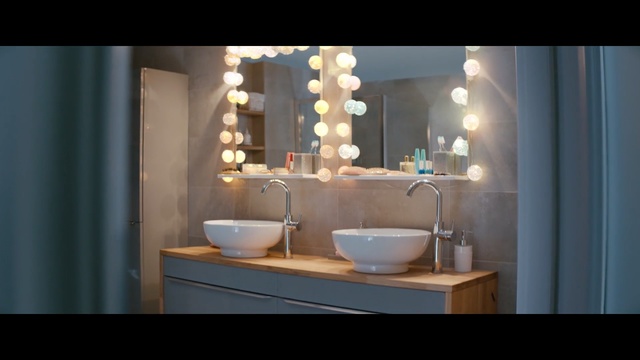 Video Reference: Bathroom, Room, Property, Plumbing fixture, Interior design, Lighting, Bathroom sink, Sink, Bathroom cabinet, Tap