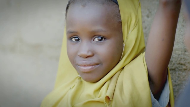 Video Reference: Face, Child, Cheek, Skin, Yellow, Head, Nose, Eyebrow, Forehead, Eye