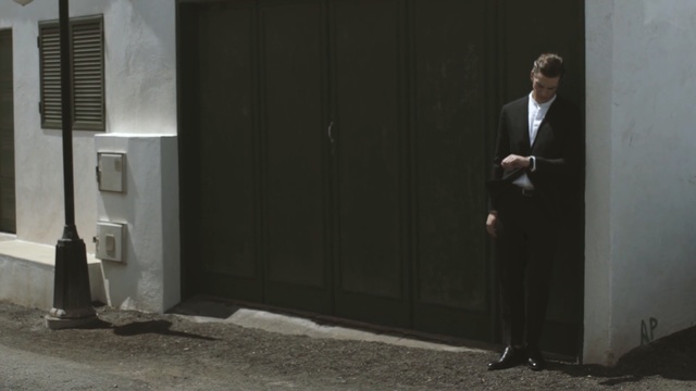 Video Reference: Standing, Suit, Wall, Gentleman, Door, Human, Black-and-white, Businessperson, Photography, Room