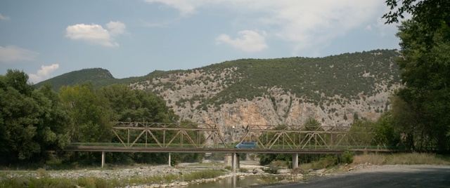 Video Reference: Bridge, Geological phenomenon, Hill station, Hill, Road, Thoroughfare, Mountain, Plant community, Concrete bridge, Plant