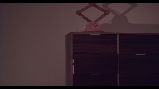 Video Reference: Furniture, Wall, Still life photography, Room, Chest of drawers, Line, Wood, Darkness, Material property, Photography