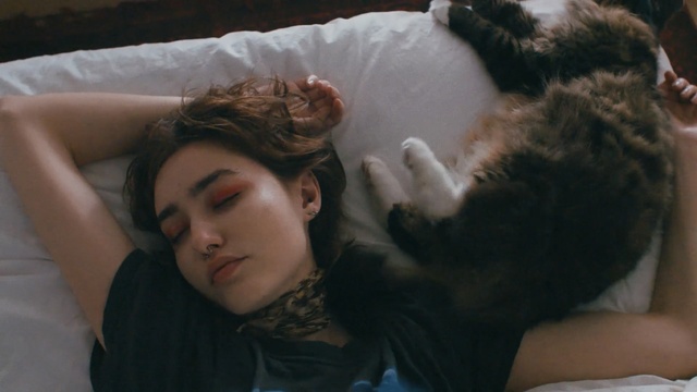 Video Reference: girl, fur, black hair, scene