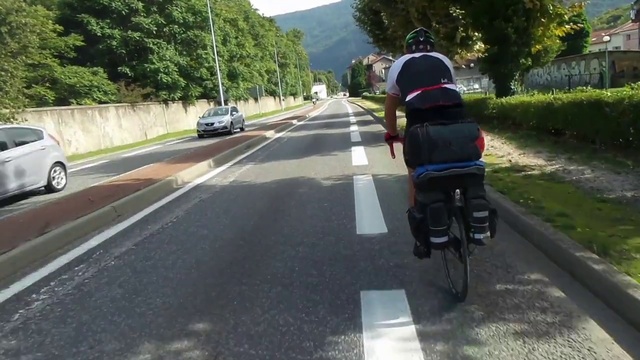 Video Reference: Road, Asphalt, Lane, Vehicle, Mode of transport, Road cycling, Cycling, Thoroughfare, Road surface, Recreation