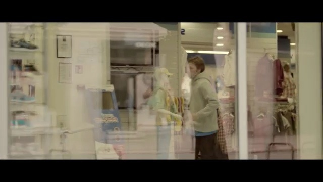 Video Reference: display window, mode of transport, room, snapshot, refrigerator, glass, interior design, girl, window, product