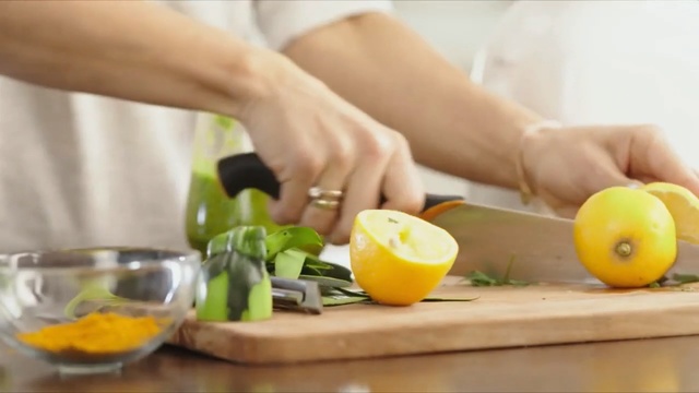 Video Reference: Food, Lemon, Fruit, Citrus, Ingredient, Hand, Plant, Vegan nutrition, Cutting board, Eating