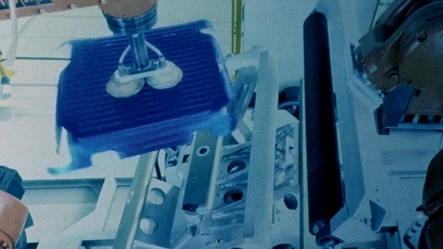 Video Reference: Blue, Person, Indoor, Table, Desk, Computer, Sitting, Small, Keyboard, Office, Laptop, Kitchen, White, Bed, Room, Woman, Man, Birthday, Holding, Laying