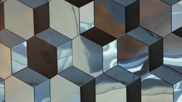 Video Reference: Blue, Pattern, Architecture, Symmetry, Brown, Design, Reflection, Line, Rectangle, Square, Person