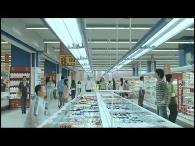 Video Reference: supermarket, aisle, retail, inventory, shopping mall, convenience store, airport terminal, building, grocery store, bookselling, Person