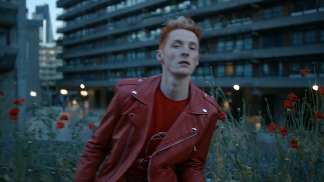 Video Reference: Red, Snapshot, Urban area, Standing, Human, Jacket, Leather jacket, Leather, Photography, Textile, Person