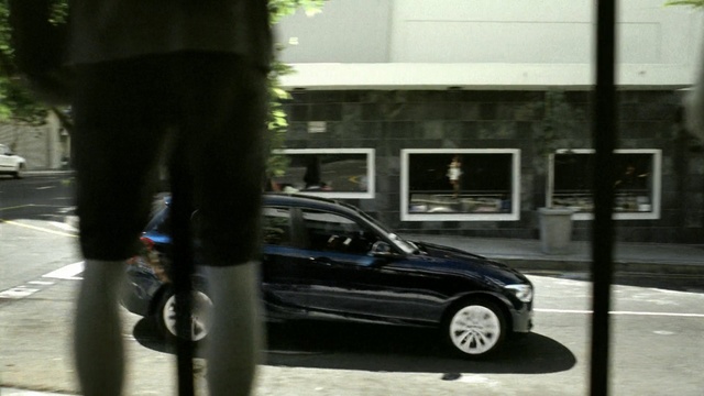 Video Reference: car, land vehicle, motor vehicle, vehicle, road, bmw, transport, mode of transport, luxury vehicle, street, Person