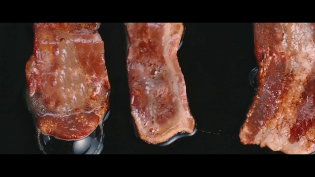 Video Reference: meat, grilling, kobe beef, red meat, animal source foods, churrasco food, flesh, beef, bayonne ham, rib, Person