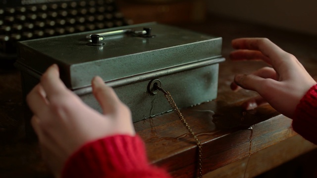 Video Reference: hand, close up, box, key, table