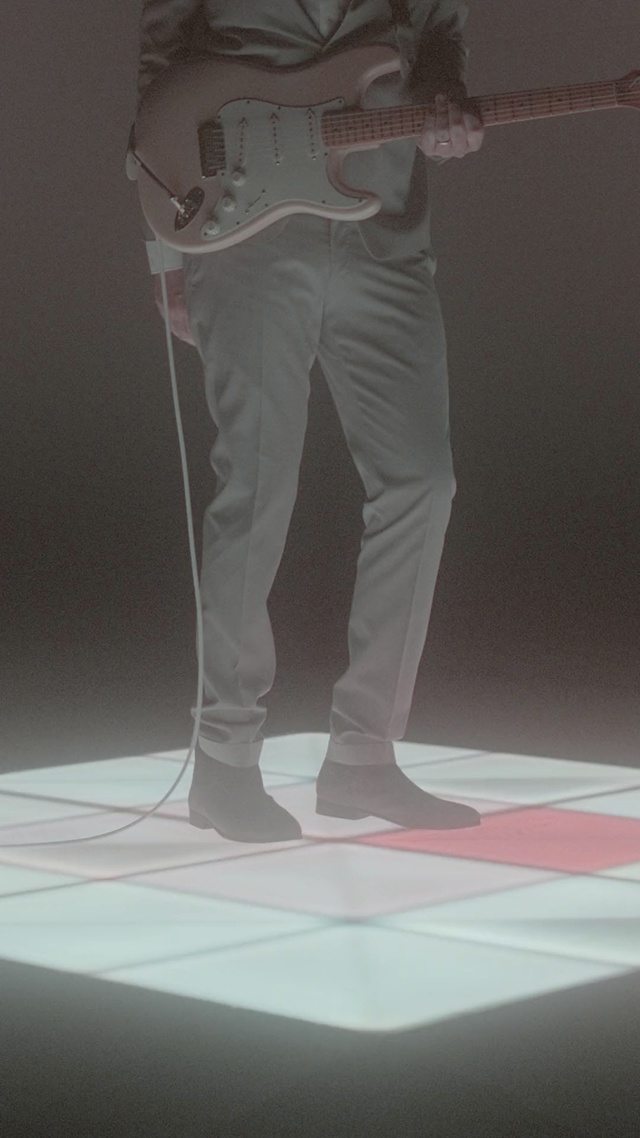 Video Reference: standing, light, fashion, floor, joint, Person