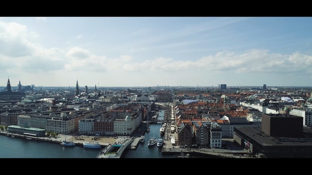 Video Reference: urban area, city, sky, cityscape, skyline, metropolitan area, metropolis, daytime, cloud, horizon, Person