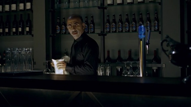 Video Reference: distilled beverage, alcoholic beverage, liqueur, drink, bar, alcohol, glass, darkness, bartender, wine, Person