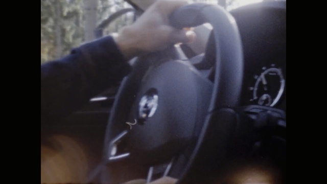 Video Reference: Arm, Car, Vehicle, Auto part, Hand, Steering wheel, Muscle, Driving, Subcompact car, Person