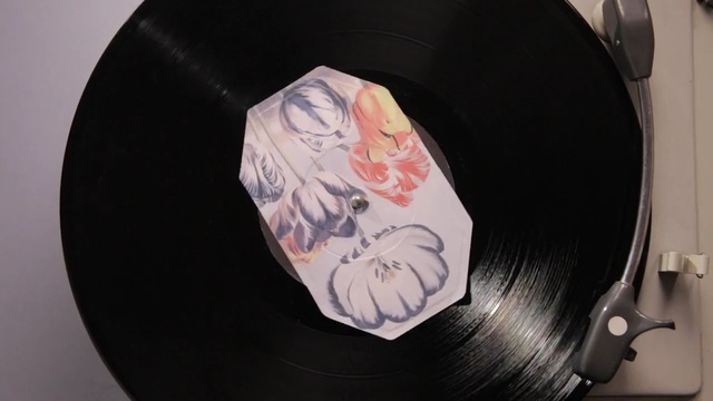 Video Reference: Gramophone record, Illustration, Black hair, Art, Publication, Fictional character, Ear, Person