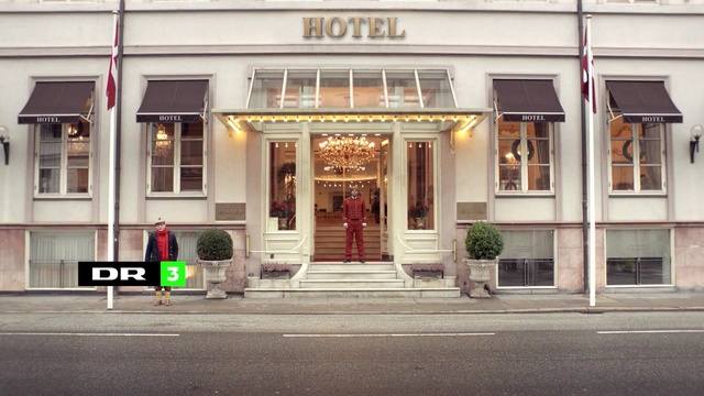 Video Reference: town, building, facade, house, window, street, city, Person