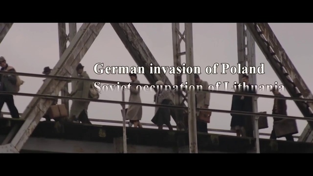 Video Reference: Iron, Metal, Scaffolding, Stairs, Architecture, Handrail, Steel, Photography, Daylighting, Nonbuilding structure, Person, Indoor, Photo, Building, Table, Sitting, Group, Man, People, Woman, White, Bridge, Standing, Hanging, Bench, Boat, Large, Room, Holding, Cake, Train, Display, Airplane, Air, Doing, Screenshot, Text