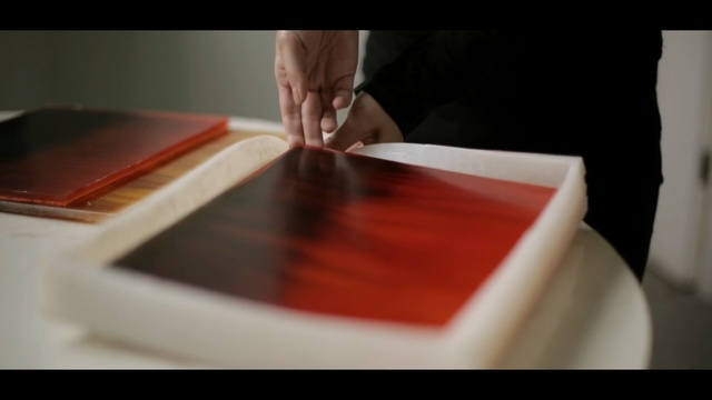 Video Reference: Red, Table, Hand, Finger, Material property, Room, Art, Photography, Flesh, Furniture