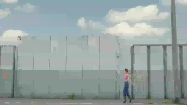 Video Reference: sky, infrastructure, residential area, mode of transport, structure, urban area, wall, cloud, building, wind