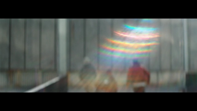 Video Reference: blue, mode of transport, light, darkness, snapshot, atmosphere, lighting, display device, biome, sunlight, Person