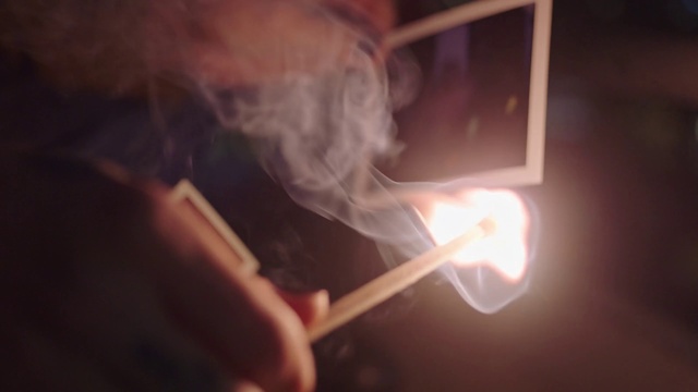 Video Reference: Smoke, Light, Smoking, Hand, Tobacco products, Flame, Darkness, Fire, Heat