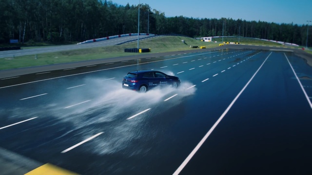 Video Reference: Vehicle, Race track, Performance car, Car, Automotive design, Mode of transport, Asphalt, Sport venue, Endurance racing (motorsport), Drifting, Outdoor, Road, Scene, Traffic, Water, Stop, Street, Sitting, Large, Riding, Driving, Red, Green, Highway, Yellow, Man, City, Standing, Blue, White, Plane, Airplane, Parked, Player, Sky, Tree, Land vehicle, Way, Wheel