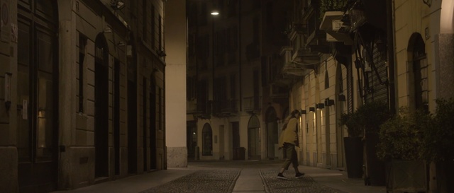 Video Reference: infrastructure, alley, street, darkness, night, building, tourist attraction, city, road, facade