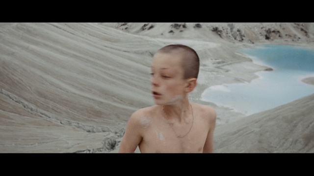 Video Reference: child, tub, vessel, beach, water, sand, vacation, summer, Person