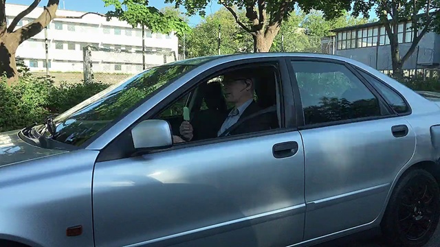 Video Reference: Land vehicle, Car, Vehicle, Window film, Interior design, Sedan, Compact car, Tints and shades, Mid-size car, Outdoor, Transport, Building, Parked, Road, Street, Rack, Sitting, Front, Dog, Side, Standing, Green, Surfing, Man, Yellow, Lot, Old, Black, Parking, City, Talking, Traffic, Mirror, Bed, Hydrant, Driving, Young, Cat, Riding, Sign, Meter, Blue, People, Truck, Tree, Auto part, Wheel, Roof, Curb